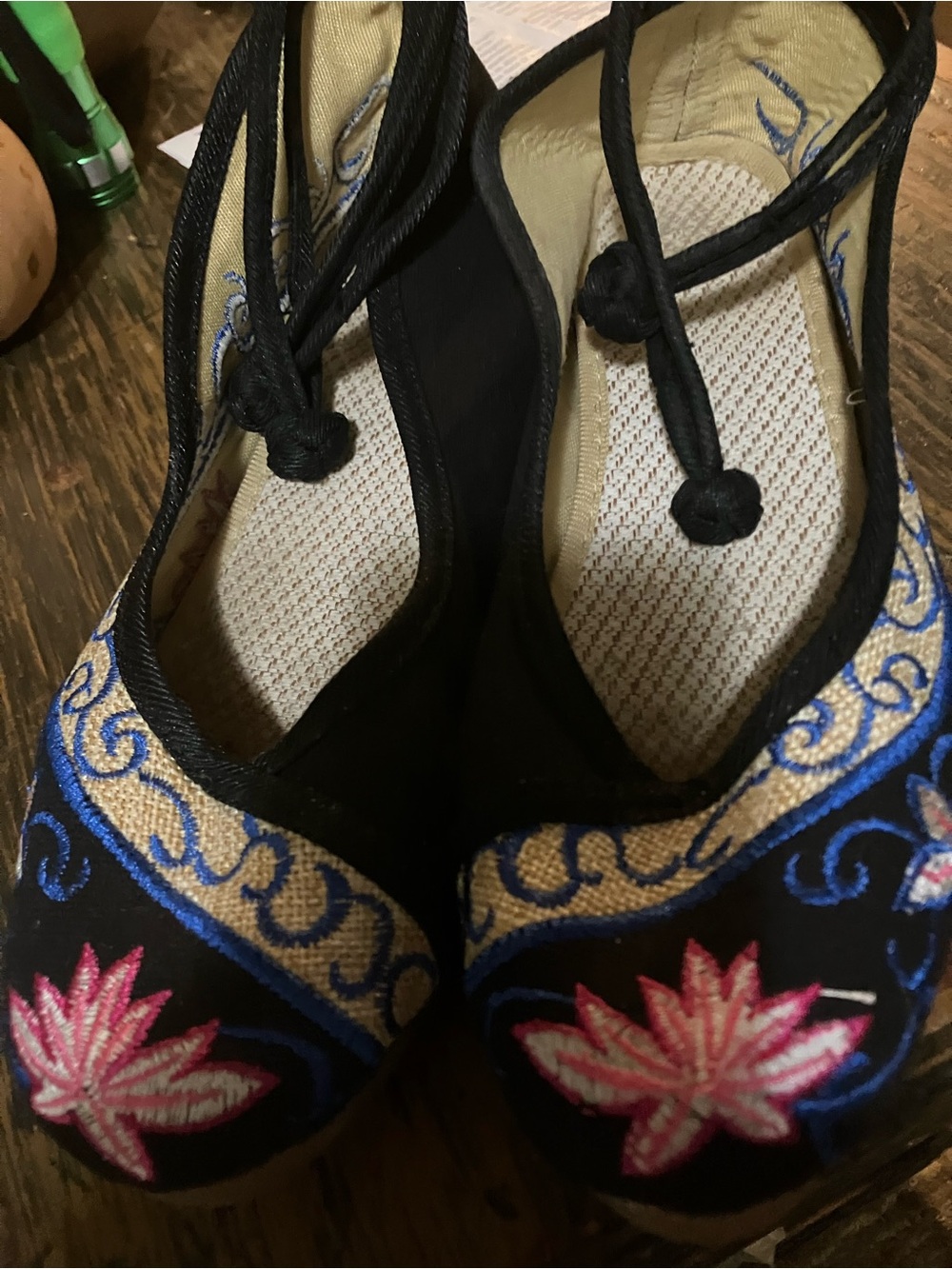 Black Embroidered Wedge Slip-On with Colorful Floral Accent!
